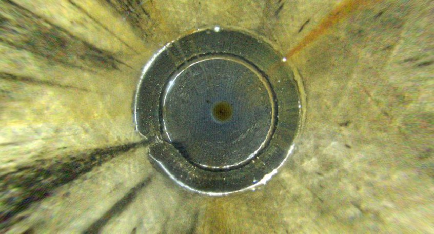 A camera image of a subsea safety valve after cleaning using pulsed power